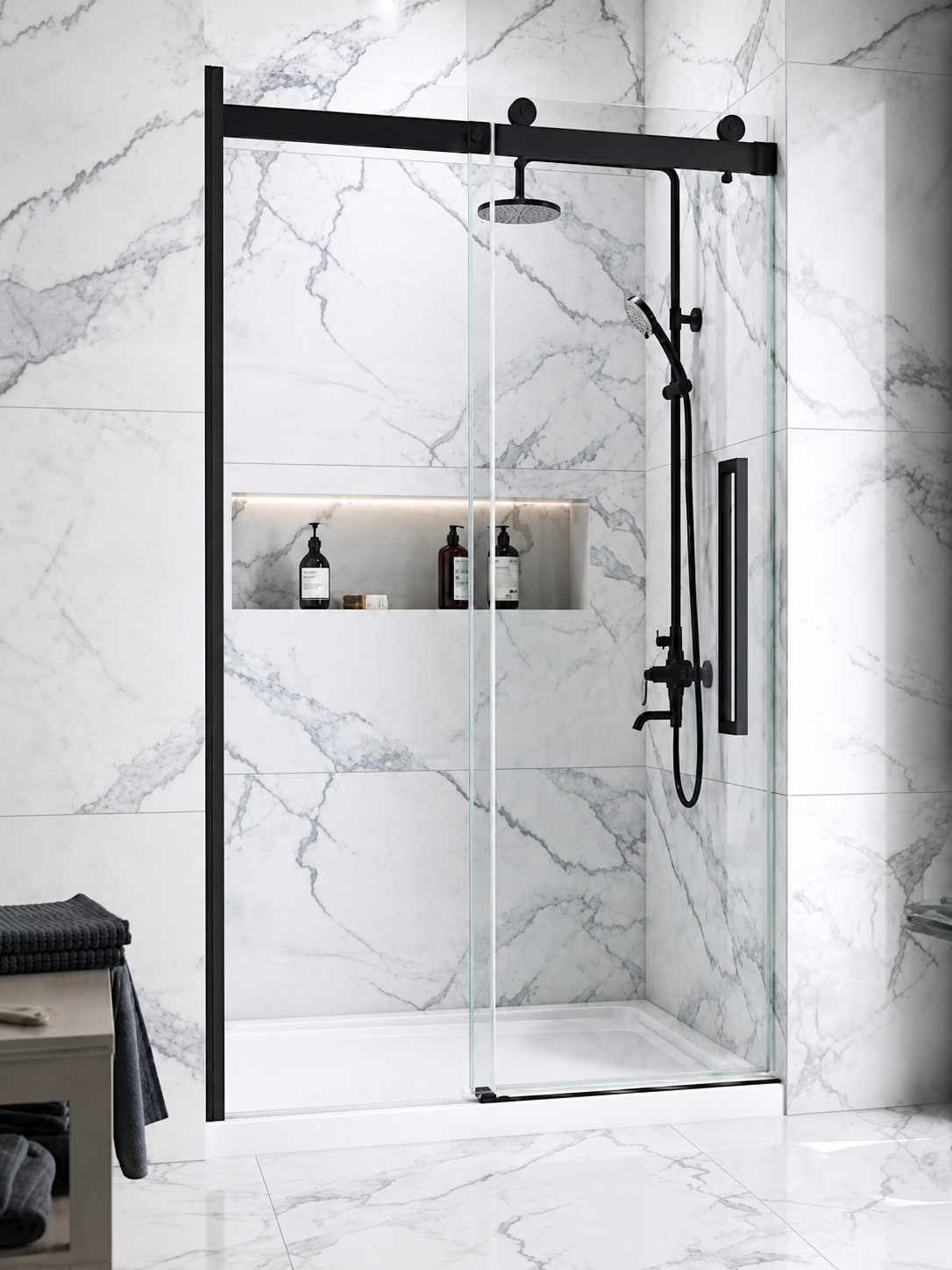 Marble-look shower with black-framed sliding glass door
