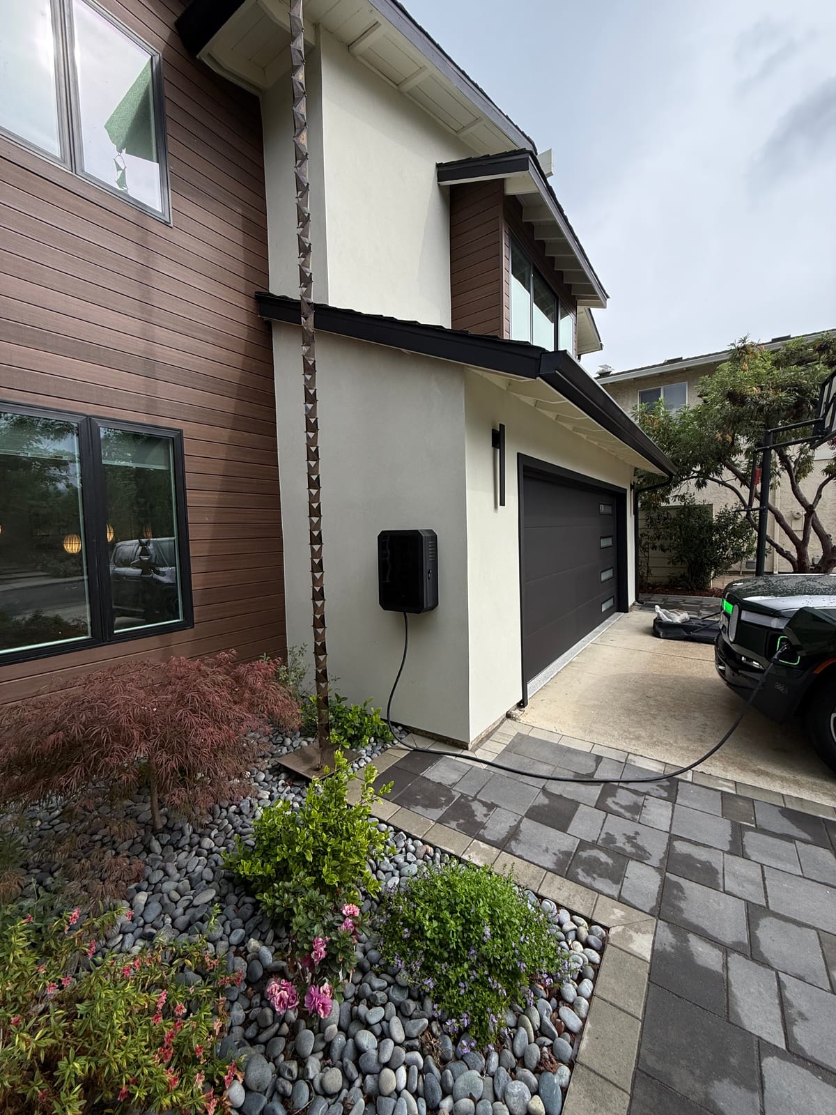 Los Gatos residence garage finish with EV charger and modern driveway
