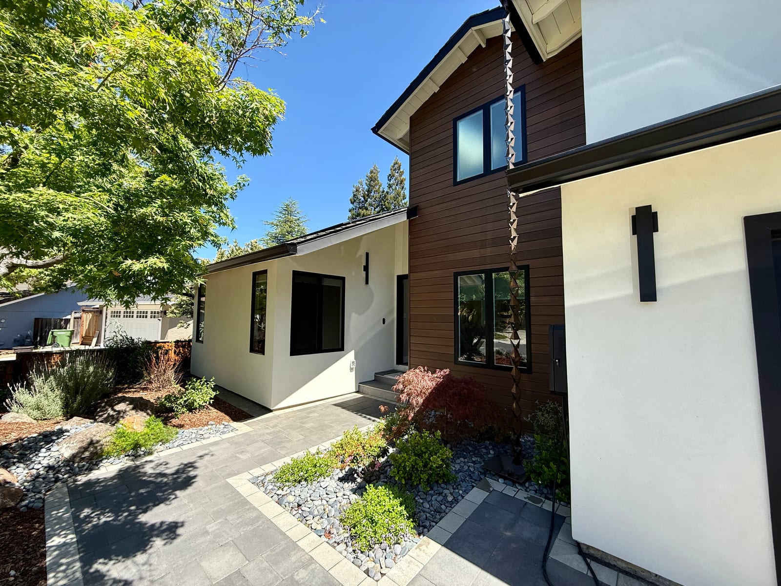 Los Gatos contemporary residential exterior with black-framed windows